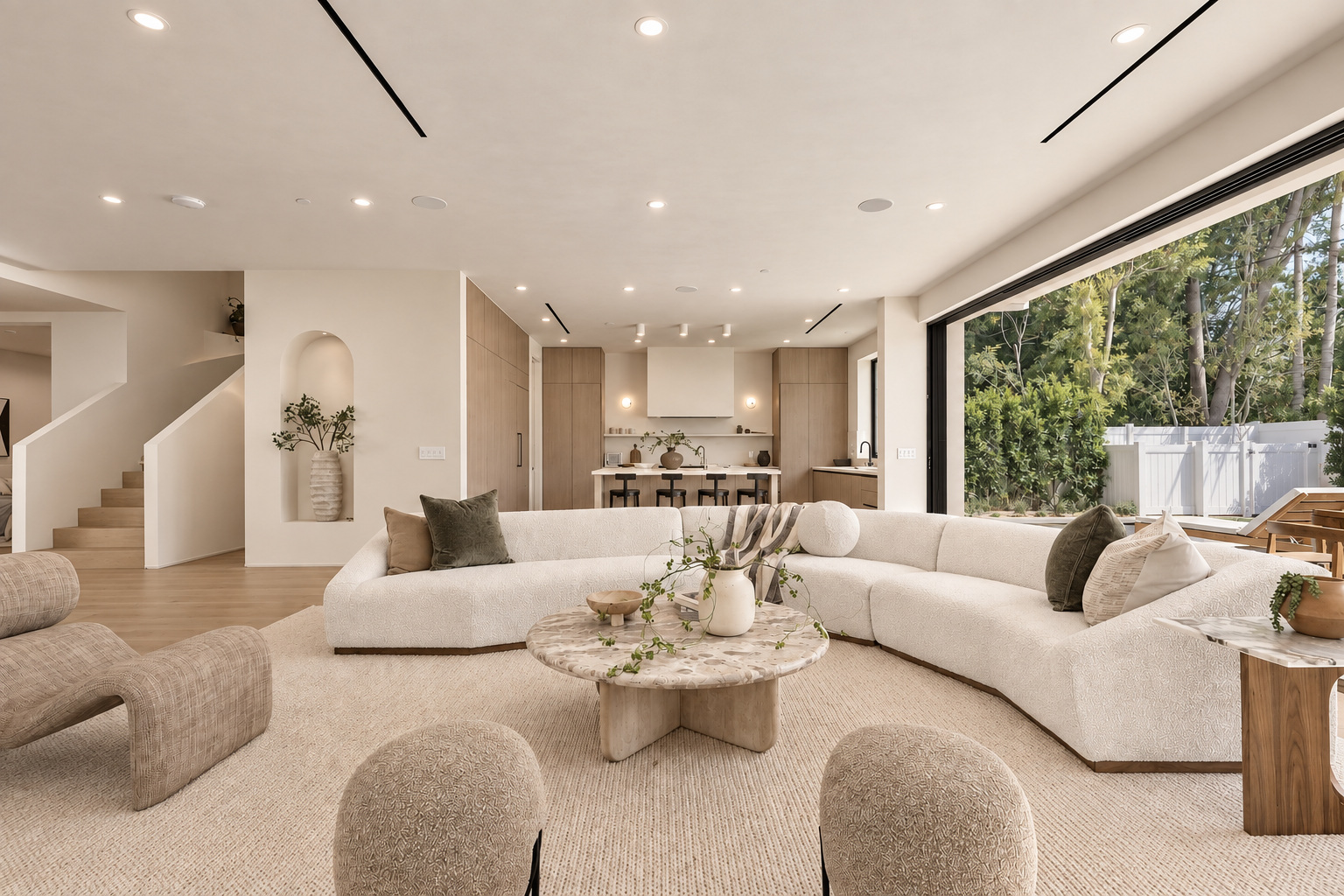 Open-plan living room by DG Builders